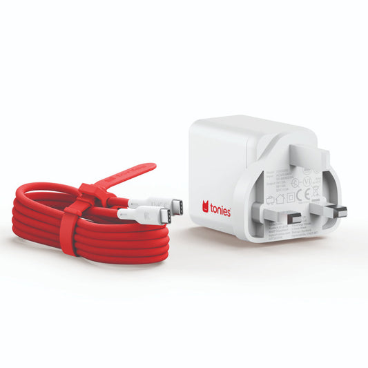 White adapter with red cord on a white background