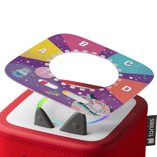 Colorful toy with letter and number design on top, featuring the brand 'tonies'.