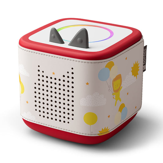Children's toy with a red border and colorful design on a white background
