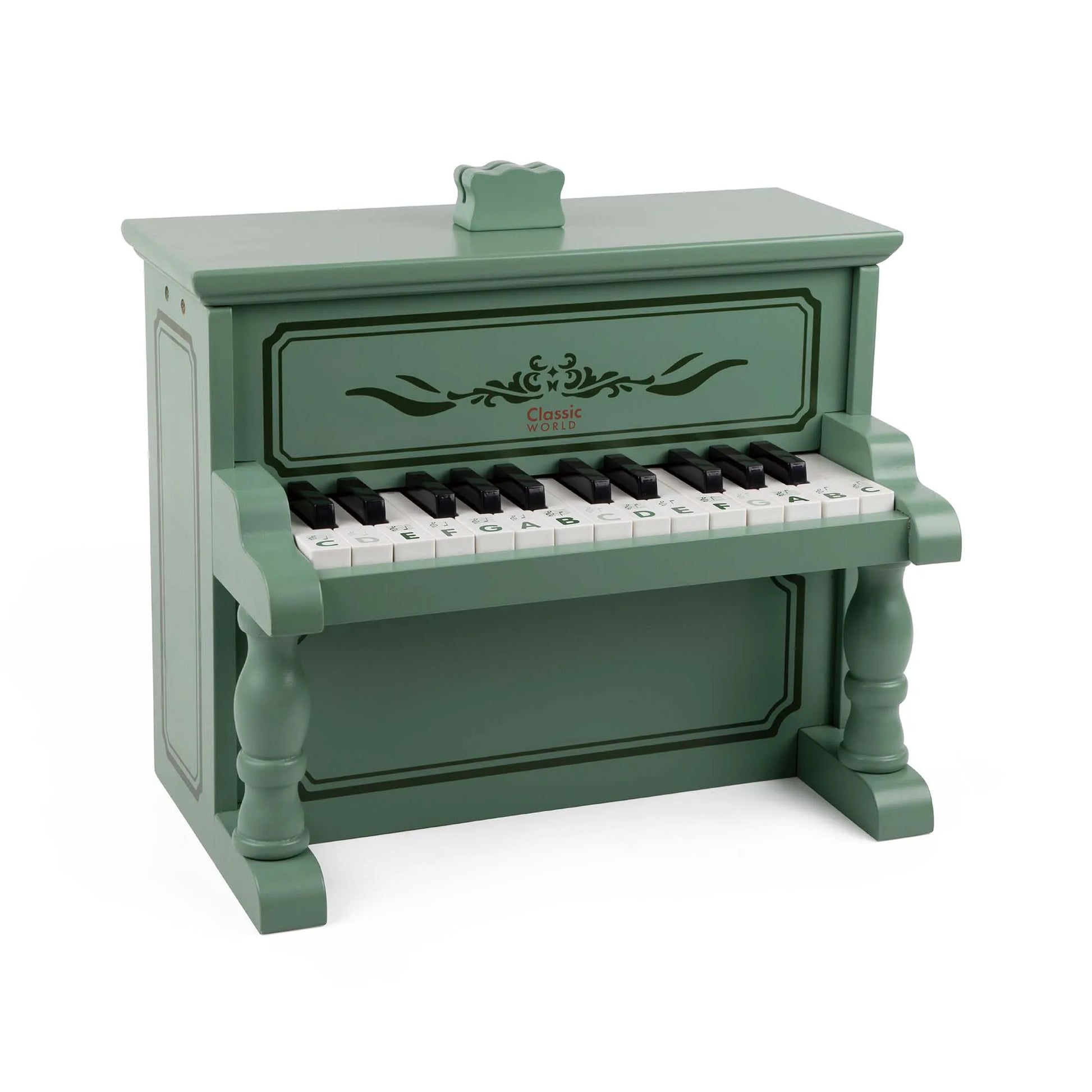 Green toy piano with white and black keys on a white background
