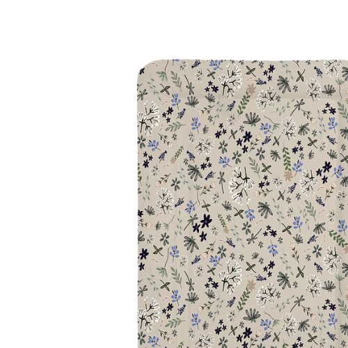 Beige fabric with small floral pattern on a white background