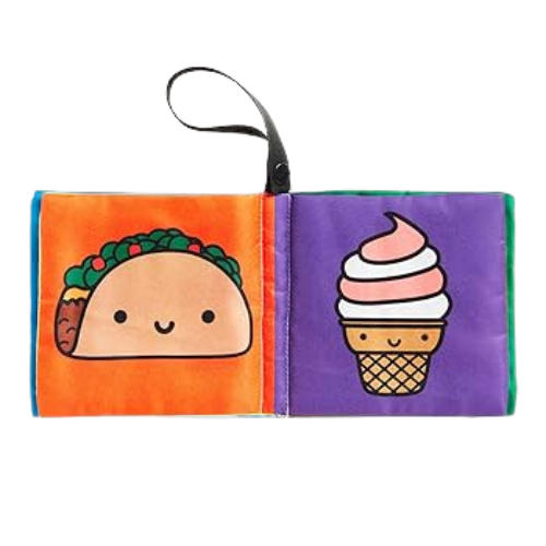 Fabric book with a taco and ice cream cone on orange and purple pages.