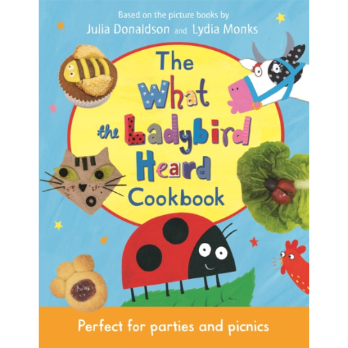 Book cover of 'The What the Ladybird Heard Cookbook' with colorful illustrations and text.