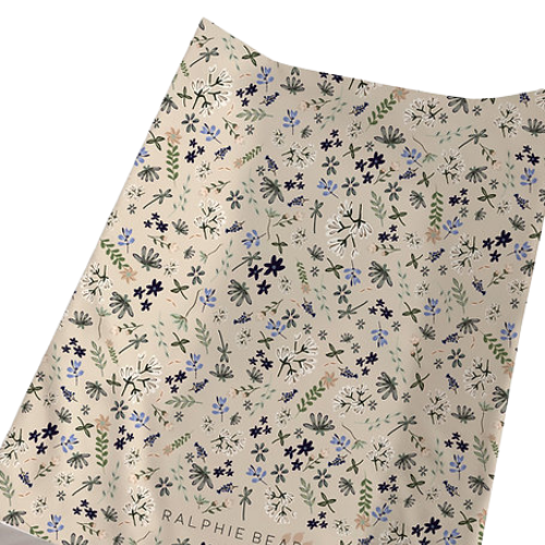 Floral patterned fabric with 'Ralphie Bear' branding on a beige background