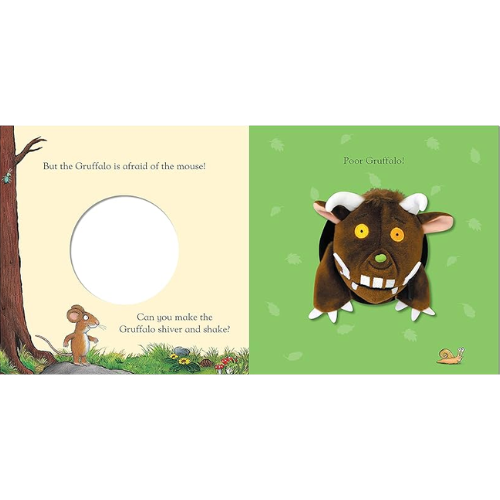 Illustration from a children's book featuring the Gruffalo and a mouse.
