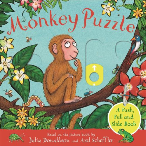 Book cover of 'Monkey Puzzle' with a monkey on a branch surrounded by flowers and birds.