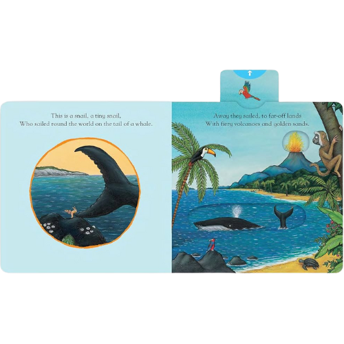 Illustrated book page with whale and tropical scene