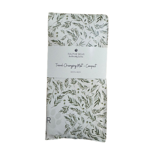 Packaged travel changing mat with leaf pattern on a white background