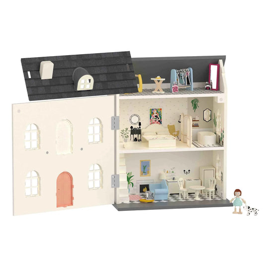 Dollhouse with detailed interior and furniture on a white background