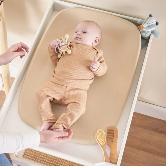 Baby on a changing pad