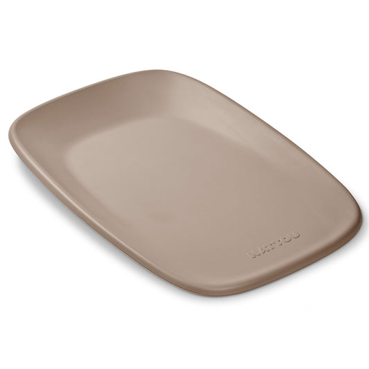 Beige ceramic platter on a white background