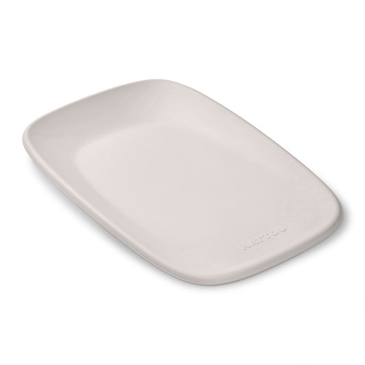 Rectangular beige plate on a white background