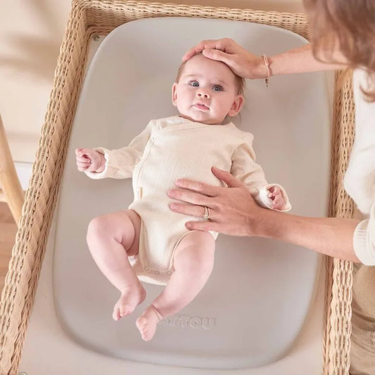 Baby on a changing pad