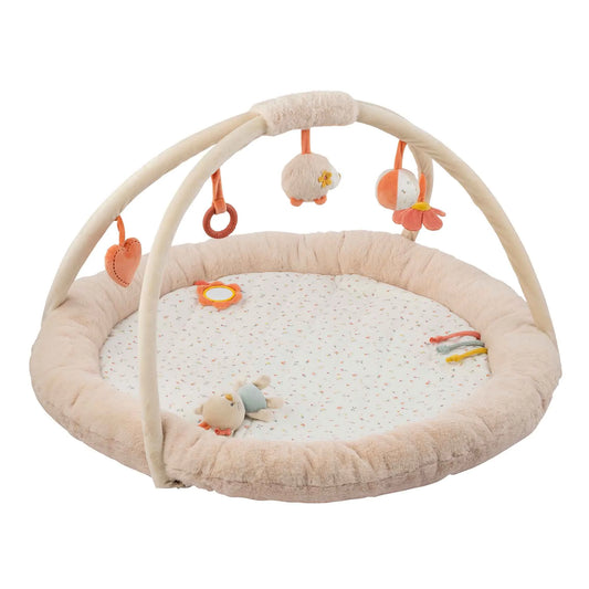 Baby play mat with hanging toys on a white background