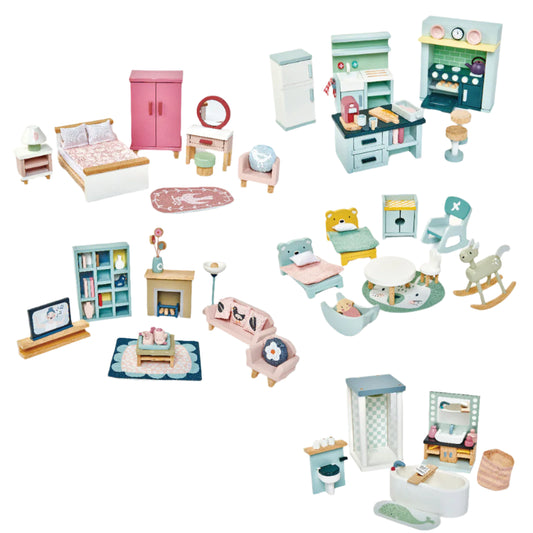 Dolls house furniture set with various rooms on a white background
