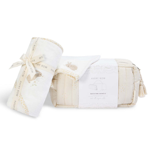 White baby blanket with a small white bag on a white background