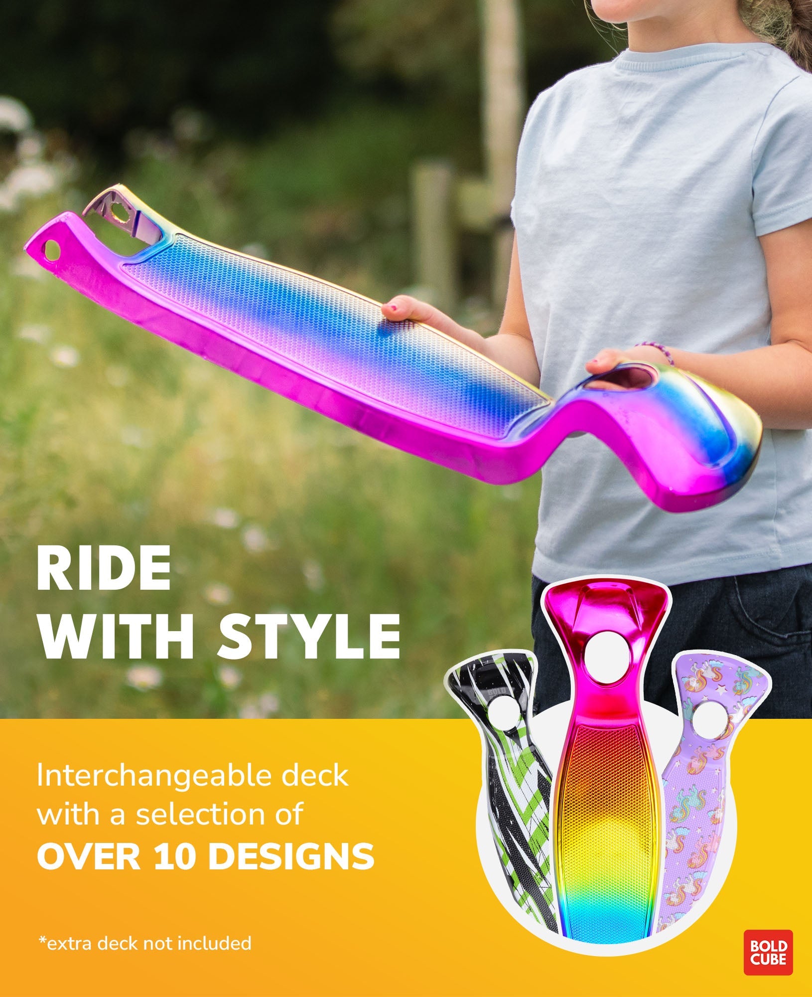 Colorful scooter deck with interchangeable design options held by a person outdoors.