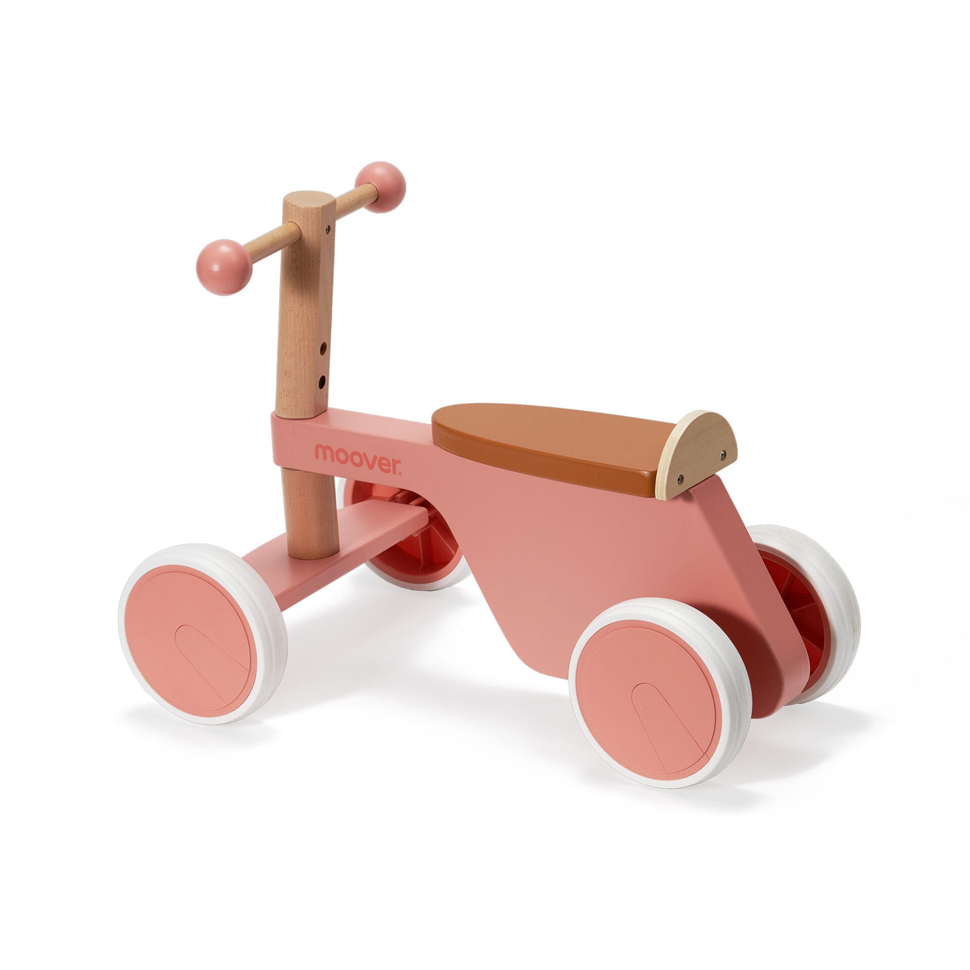 Pink and wooden balance bike on a white background