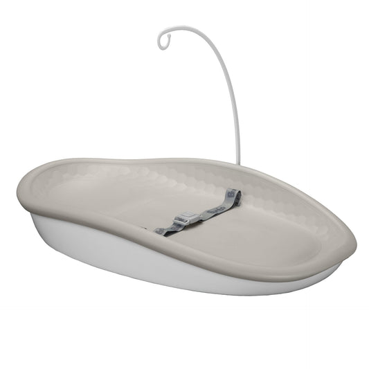 Beige changing pad with a hook on a white background