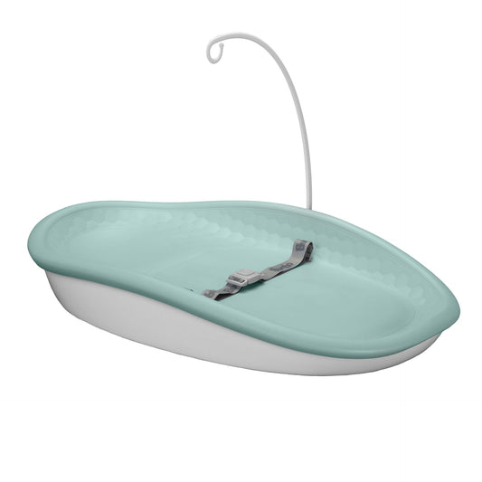 Green changing pad with a hook on a white background