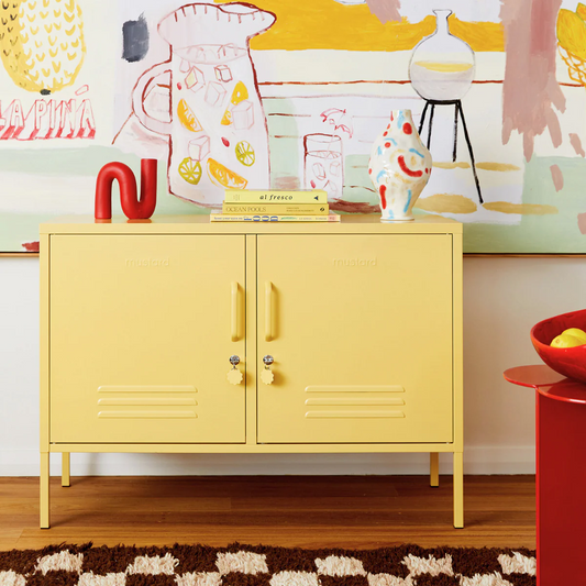 Butter yellow locker with vases