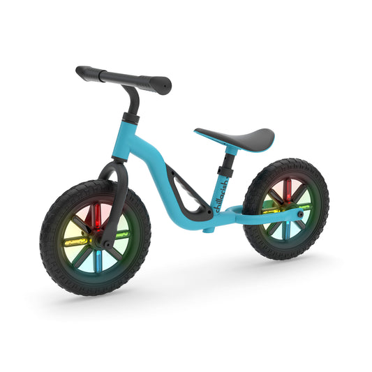 Children's balance bike with colorful wheels on a white background