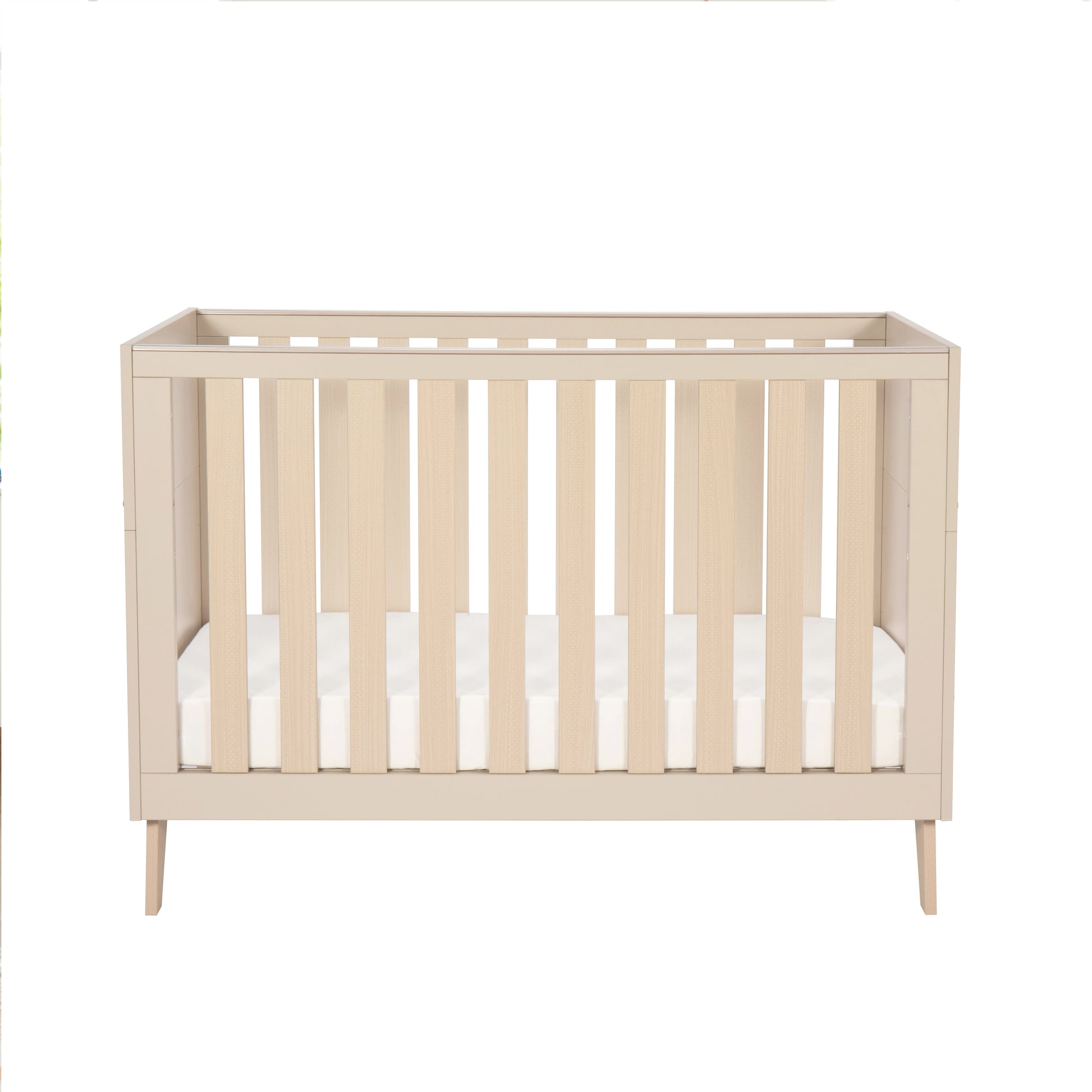 Beige cot with white mattress on a white background