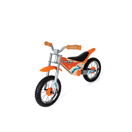 Orange balance bike with black wheels on a white background