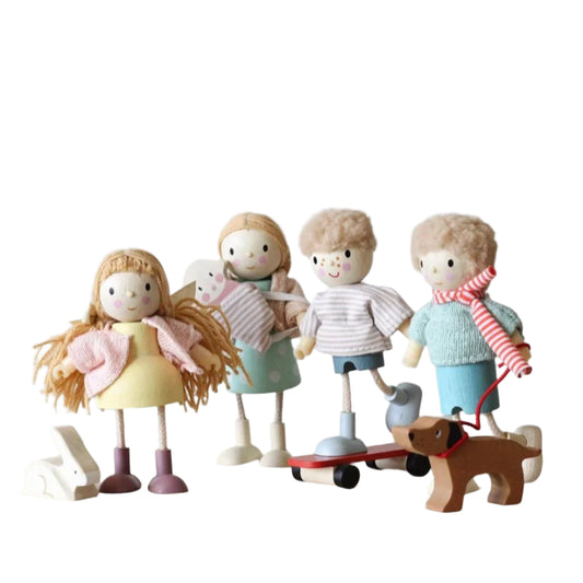 Set of wooden dolls with a dog on a light gray background