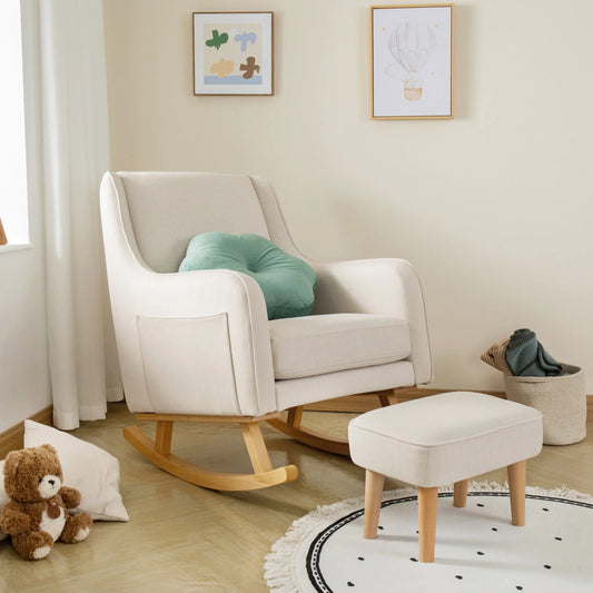 White rocking chair with a green cushion in a nursery setting