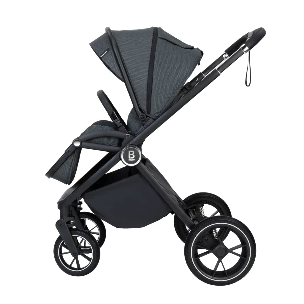 Black baby stroller with canopy on a white background
