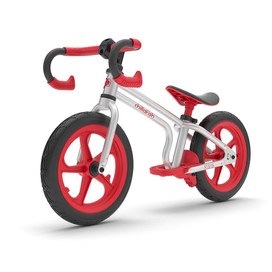 Children's balance bike with red and black design on a white background