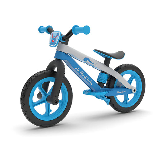 Children's balance bike with blue wheels and handlebar grips on a white background