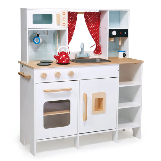 Children's play kitchen set with wooden countertop and white cabinets on a white background