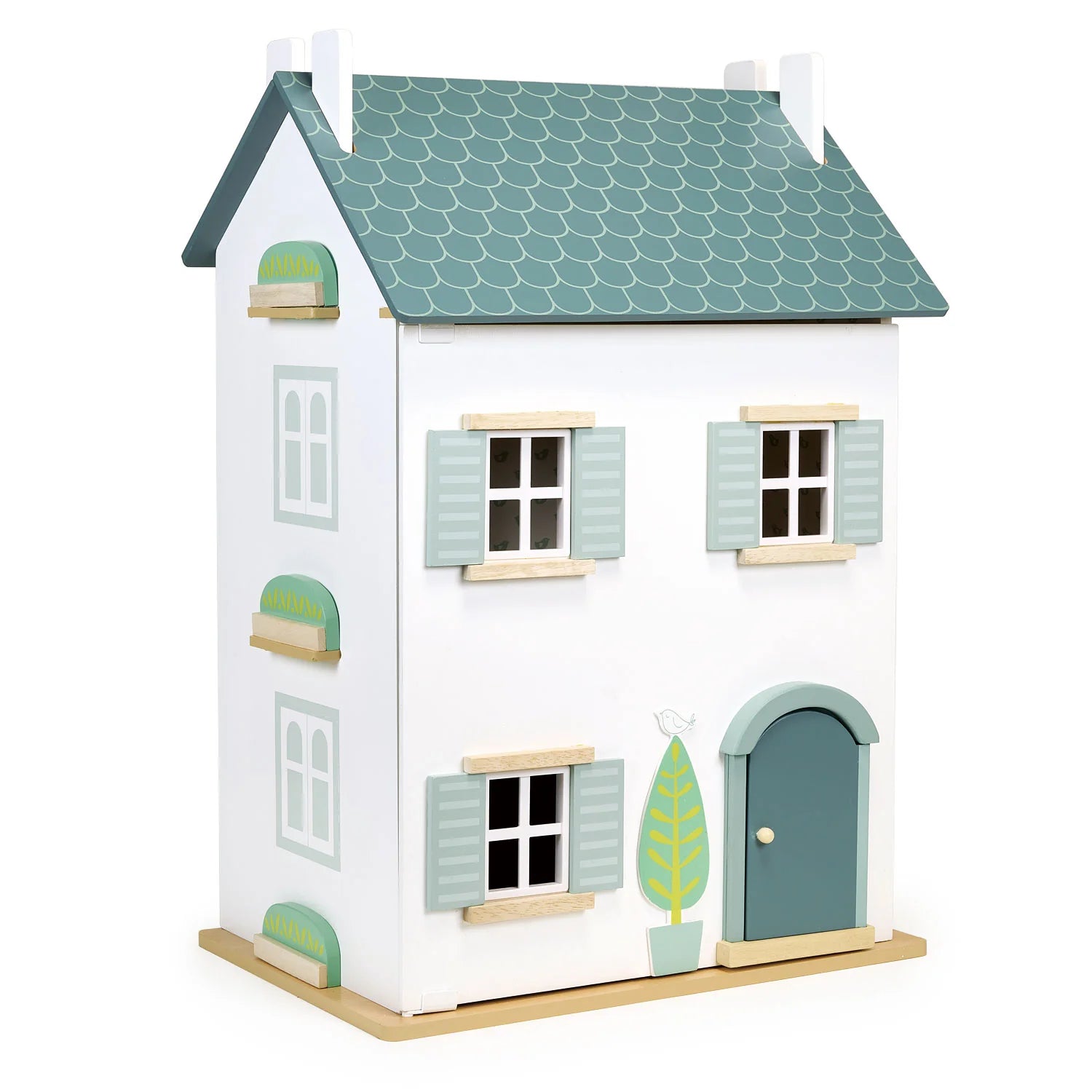 Toy dollhouse with a green roof and white walls on a white background