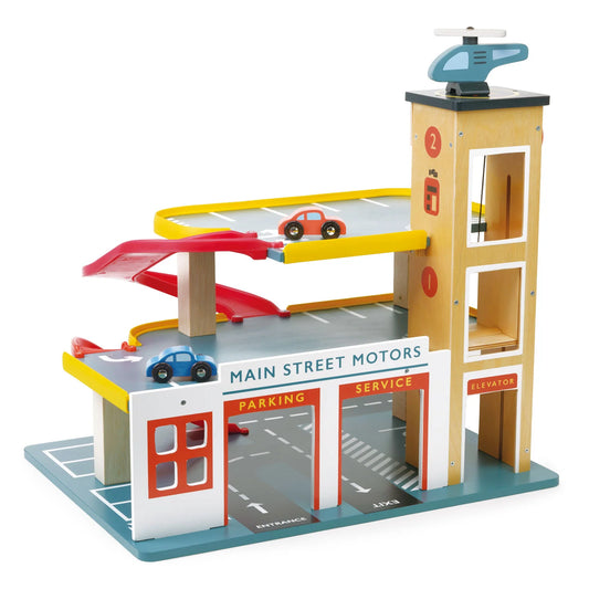 Toy parking garage set with cars on a white background