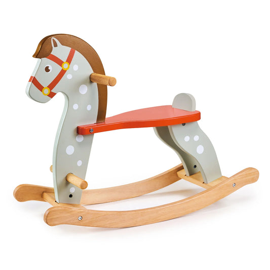 Wooden rocking horse with a red seat on a white background