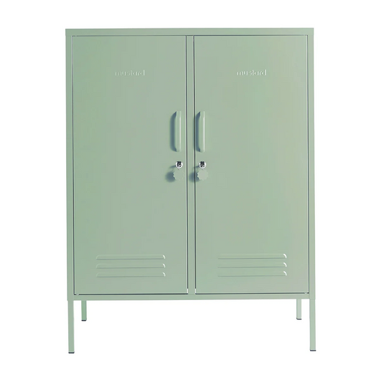 Green metal cabinet with two doors on a white background