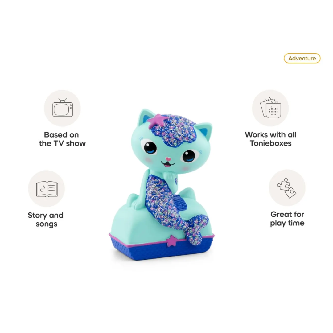 Toy figure of a mermaid cat with features listed on a white background