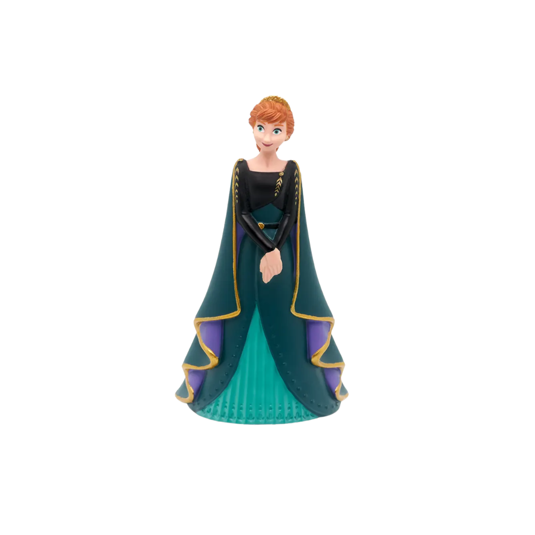 Toy figure of a character in a green dress with purple accents on a white background