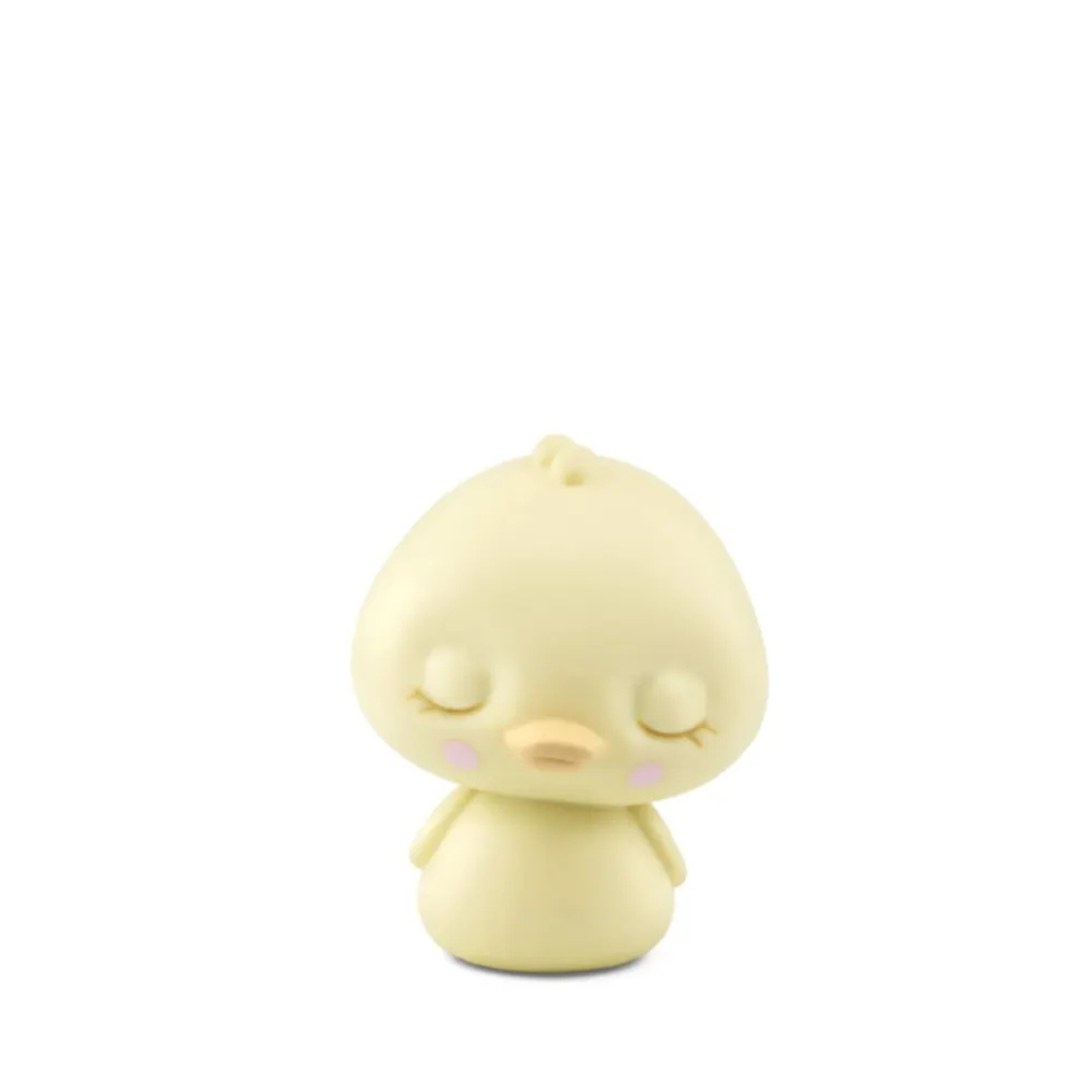 Yellow bird-shaped figurine on a white background