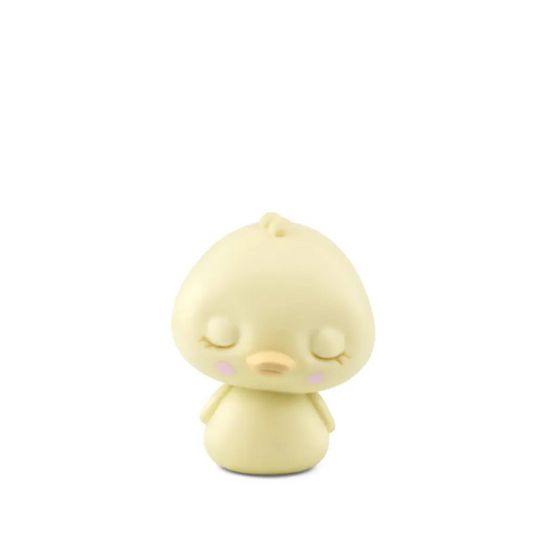 Yellow bird-shaped figurine on a white background