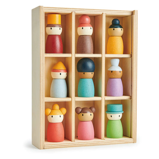 Set of colorful wooden dolls in a wooden display case on a white background