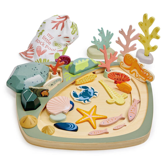 Colorful wooden ocean-themed puzzle with sea creatures and coral on a white background