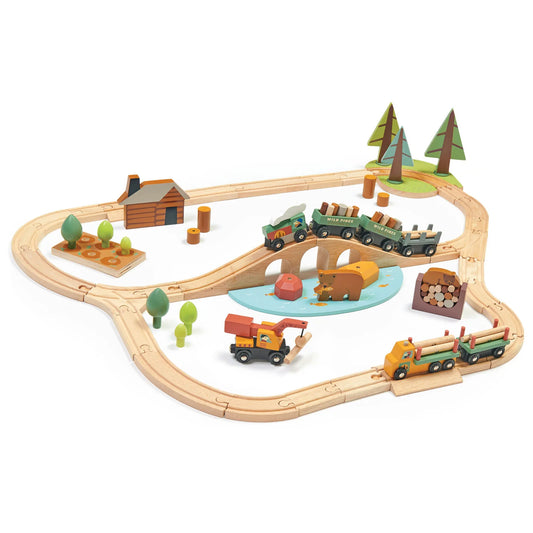 Wooden train set with tracks and miniature trains on a white background