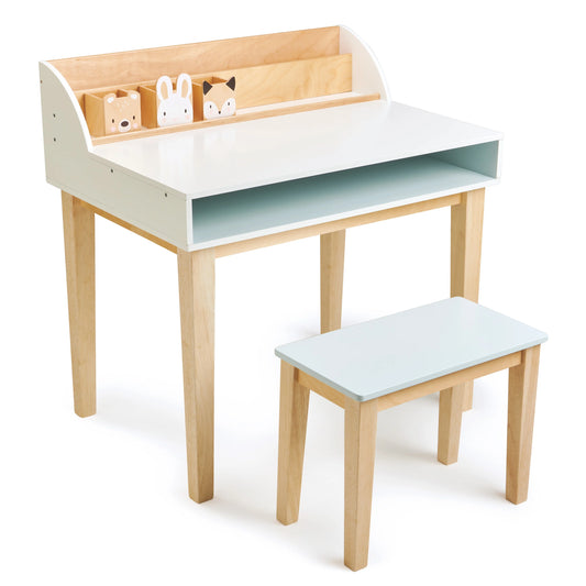 Children's wooden desk with a white surface and a smaller matching chair on a white background