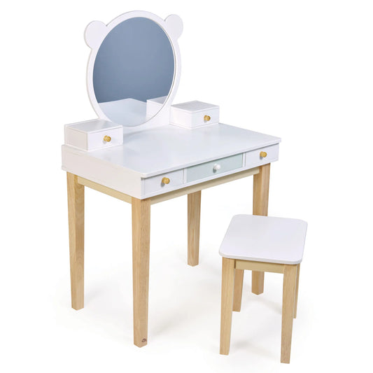 Children's vanity table with mirror and stool on a white background