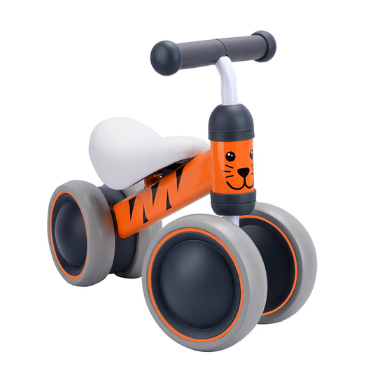 Children's balance bike with tiger design on a white background