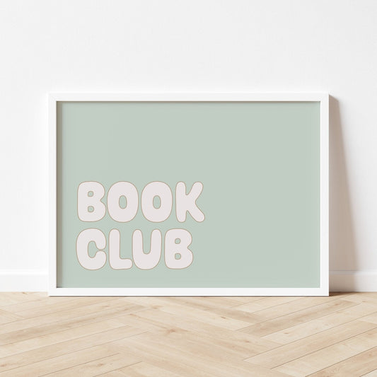 Framed poster with 'BOOK CLUB' text on a light green background