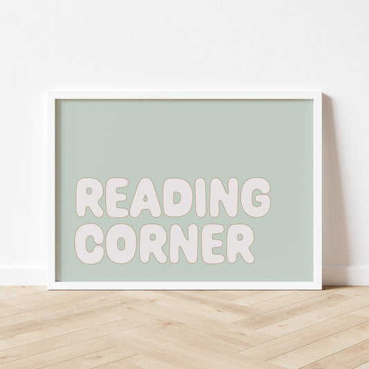 Framed poster with 'READING CORNER' text on a light green background
